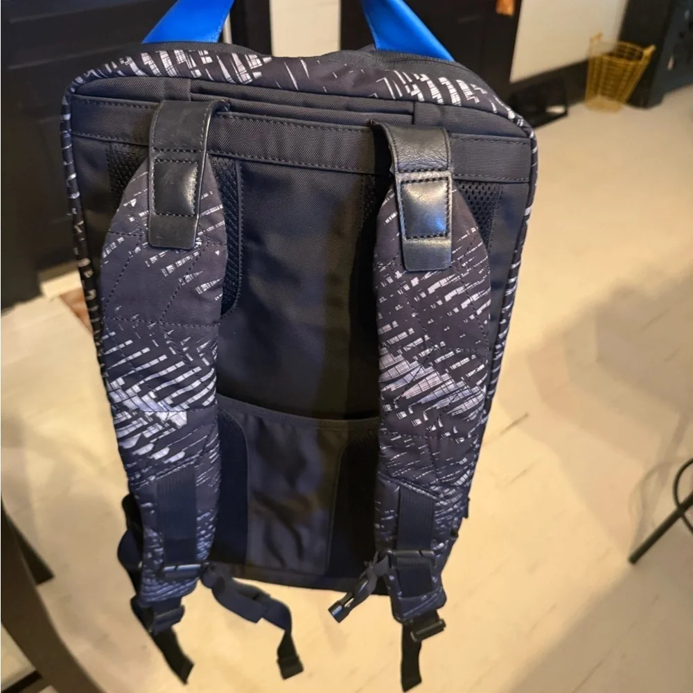 Tumi Black and Gray Patterned Duffel Backpack